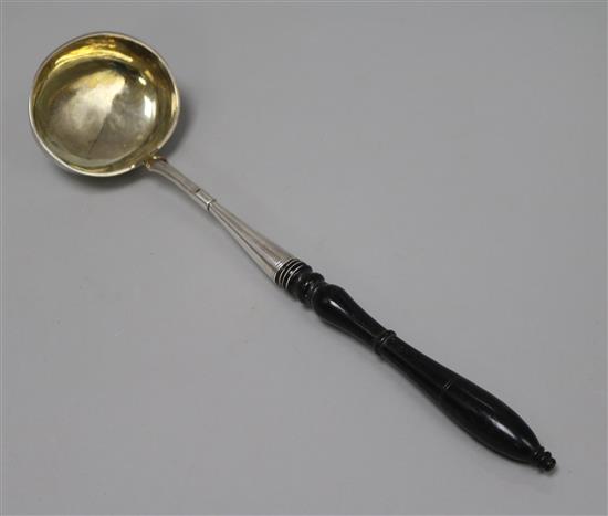 A mid 19th century Russian 84 zolotnik silver ladle, with turned wooden handle, assay master, Andrei Kovalsky, Moscow, 1849,